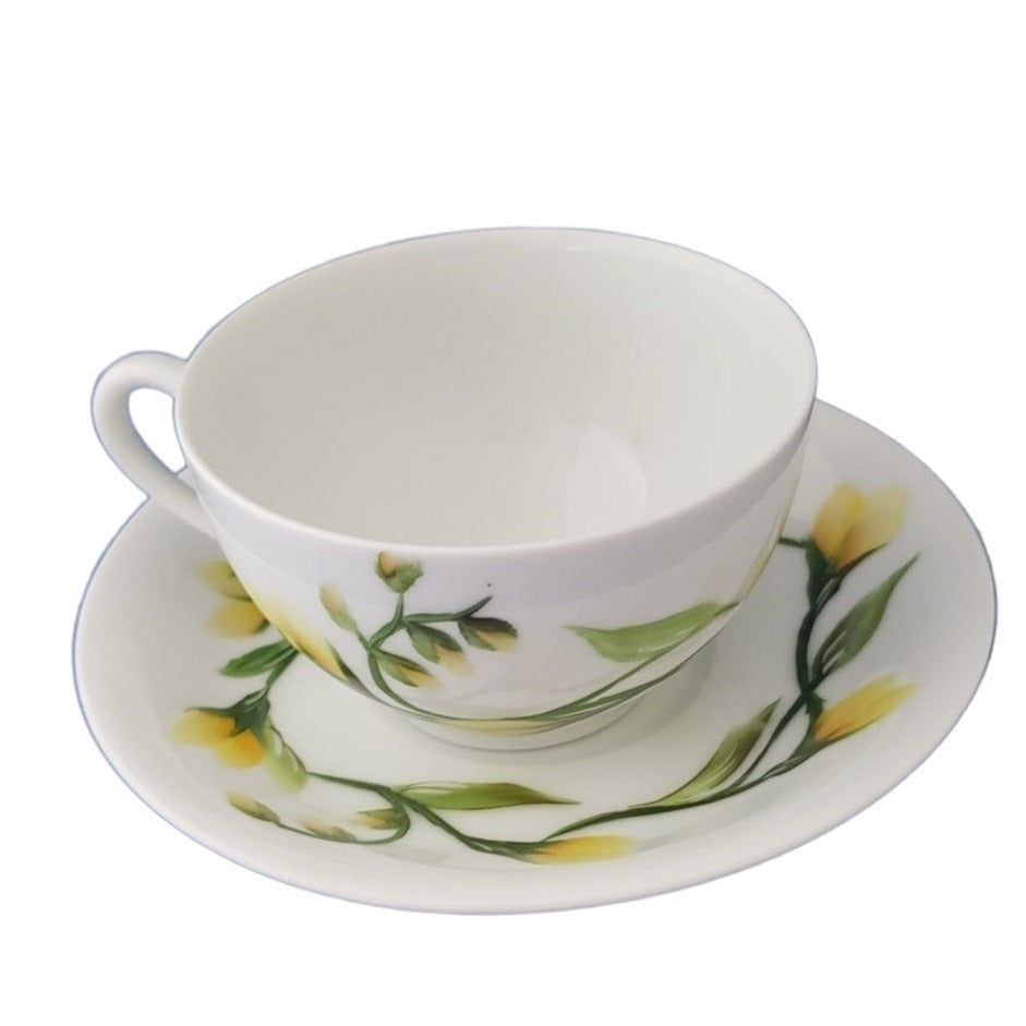 Cup and Saucer with spring yellow flowers designs